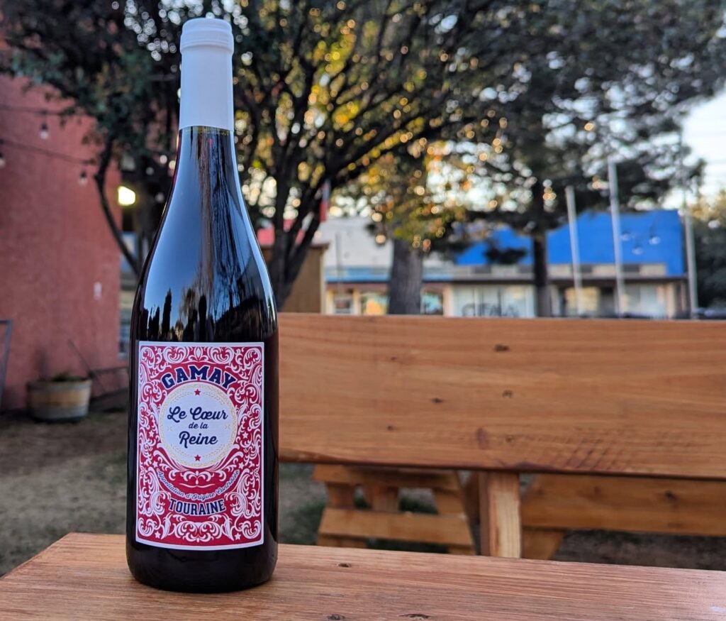 A bottle of wine on a table at Copper Rose Wine